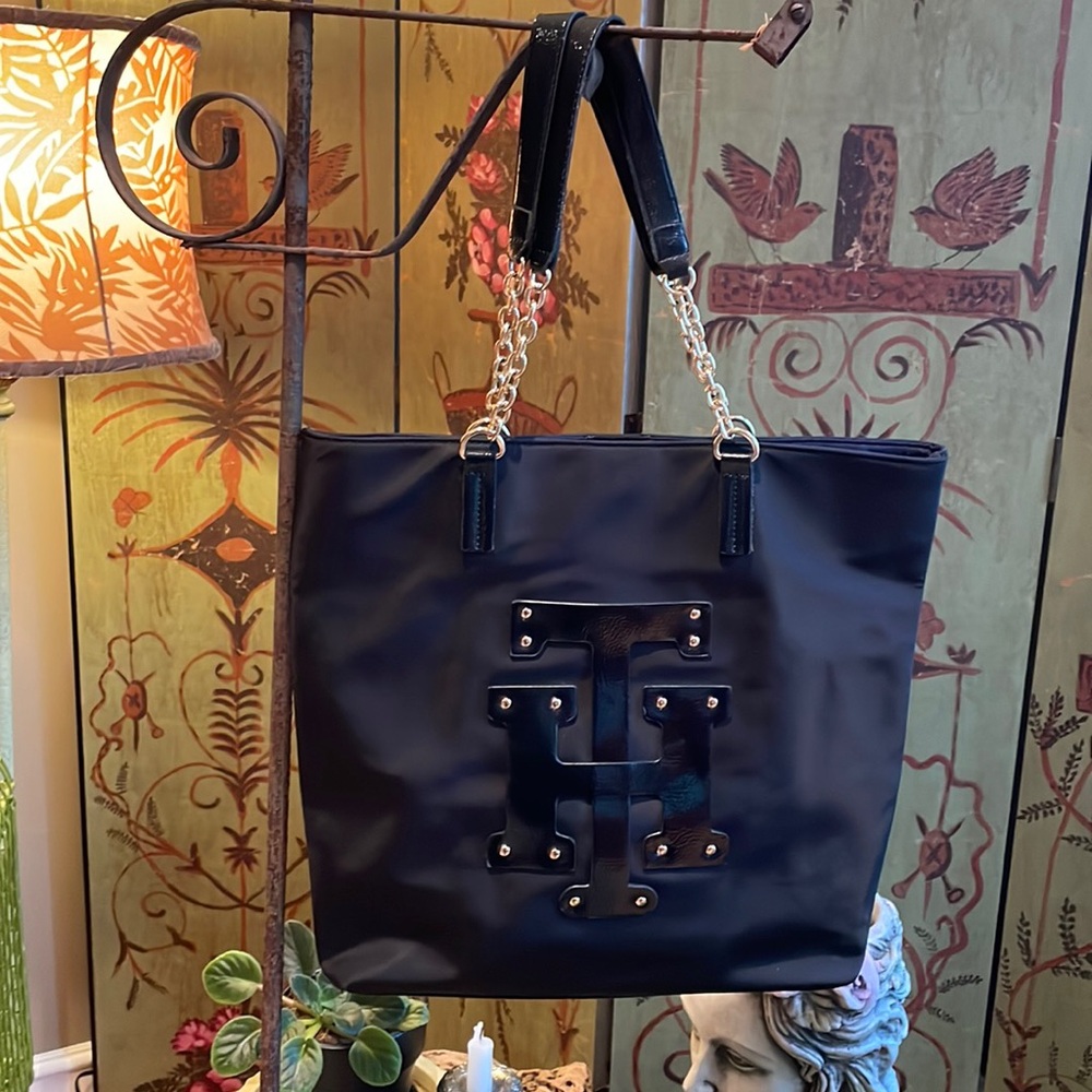 Great Tommy Hilfiger black tote. Inside perfectly clean with zipper pocket